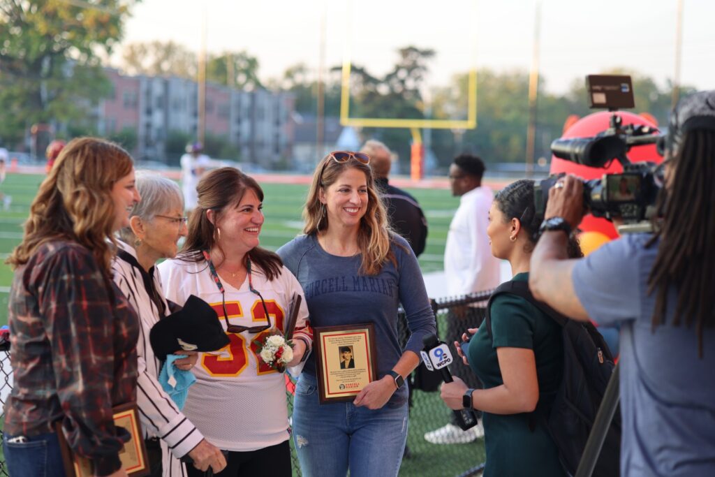 The Barattieri family talks to WCPO following the dedication of Guy “Bear” Barattieri ‘88 field.